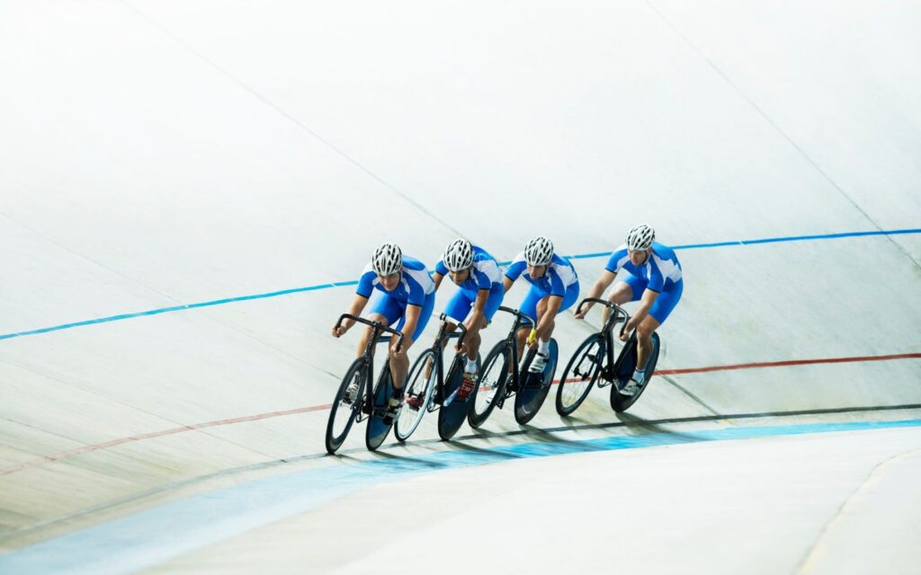 Cyclists enjoying rides at the Velodrome, part of family attractions in Abu Dhabi.