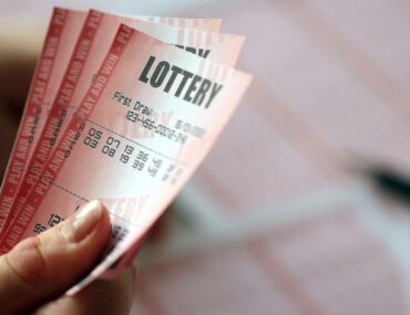 Graphic displaying lottery tickets for the Big Ticket Abu Dhabi raffle.