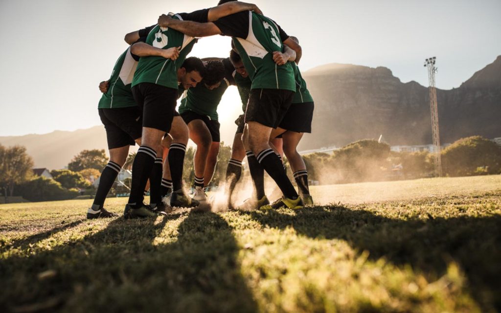 Men playing Rugby at Al Ain Rugby Club