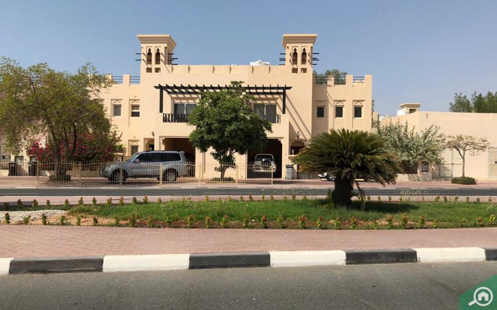 Street view of Al Hamra Village, which has affordable villas for sale in the UAE under AED 1 million