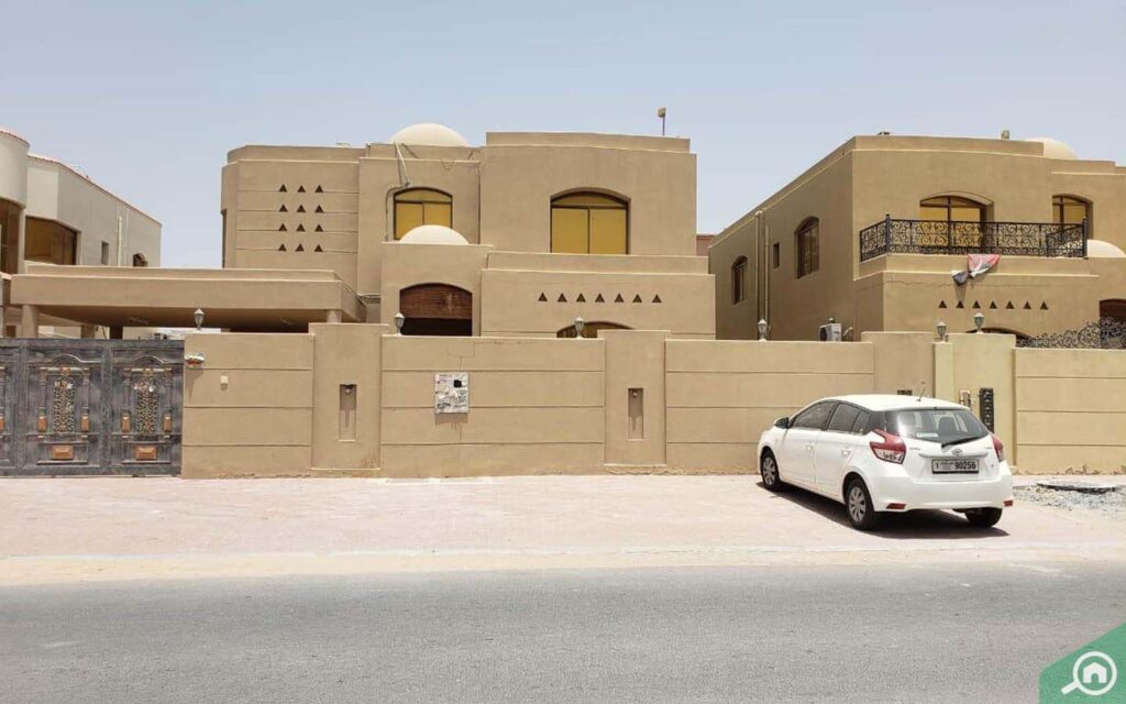 Al Mowaihat family villas with sandy hues
