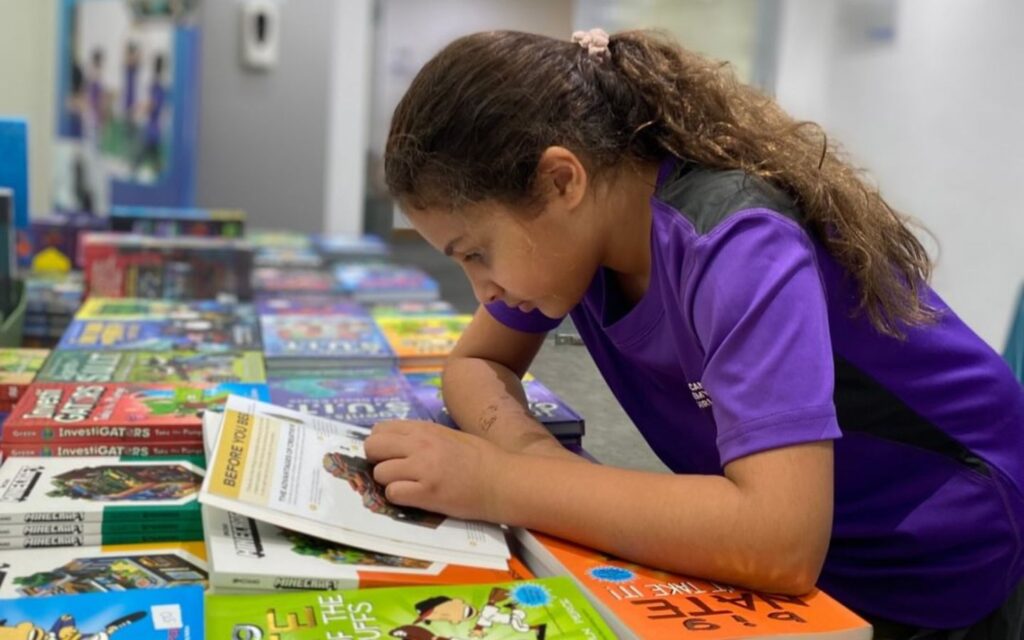 Students at American Academy for Girls Dubai engaged in learning activities