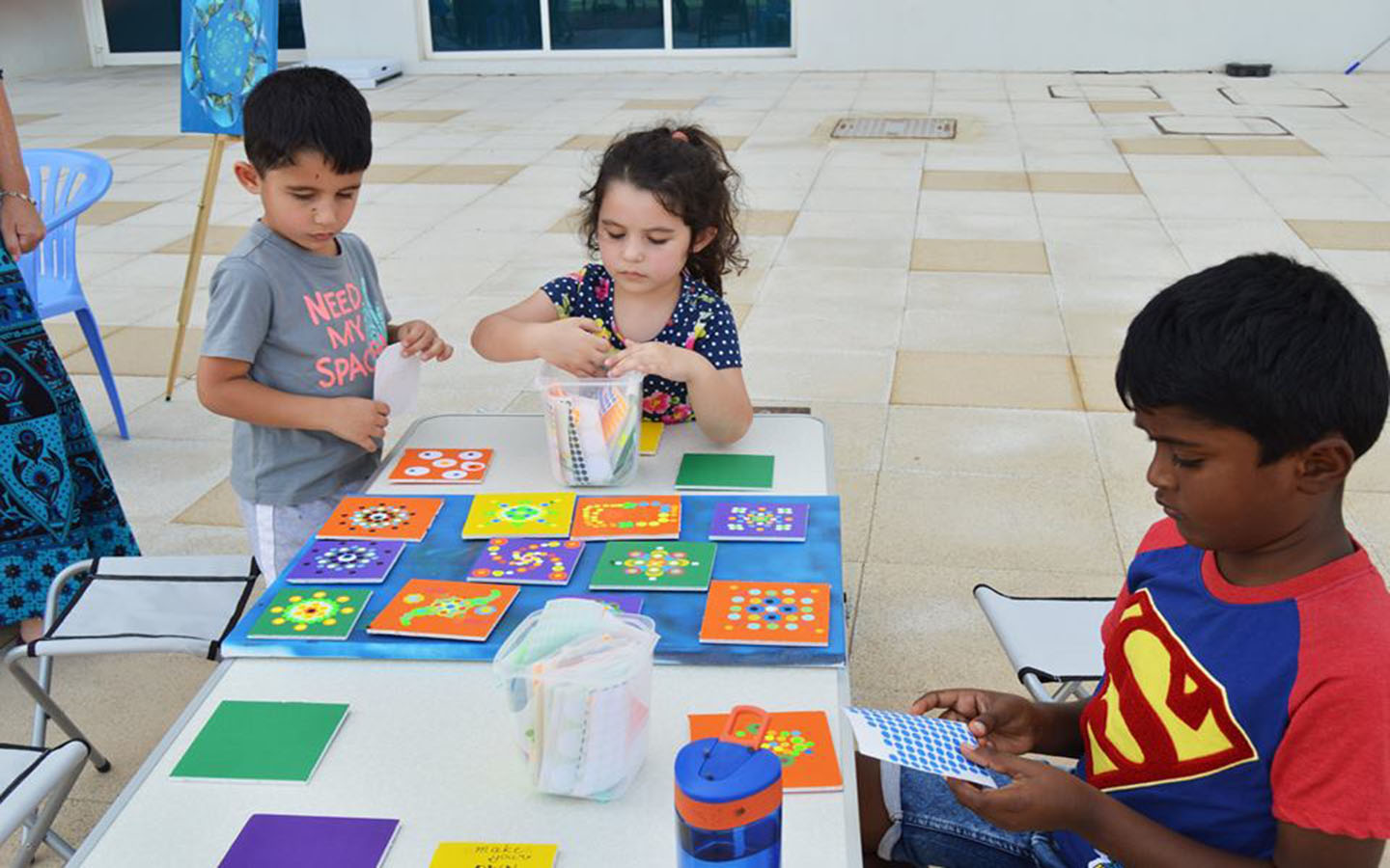 Students collaborating with their fellows at Amity International School