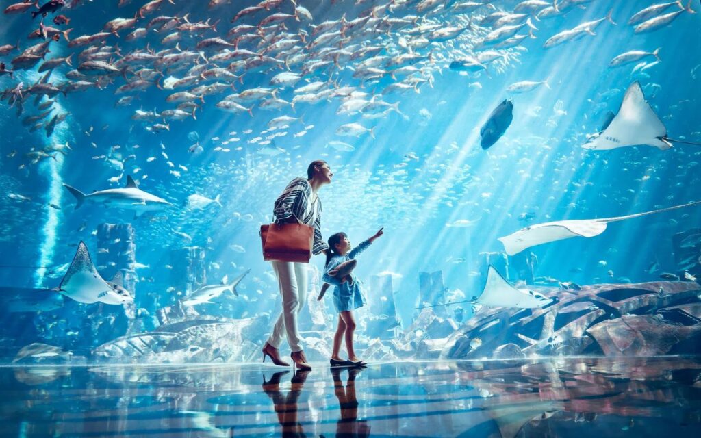 lost city of Atlantis, surrounded by shimmering marine life