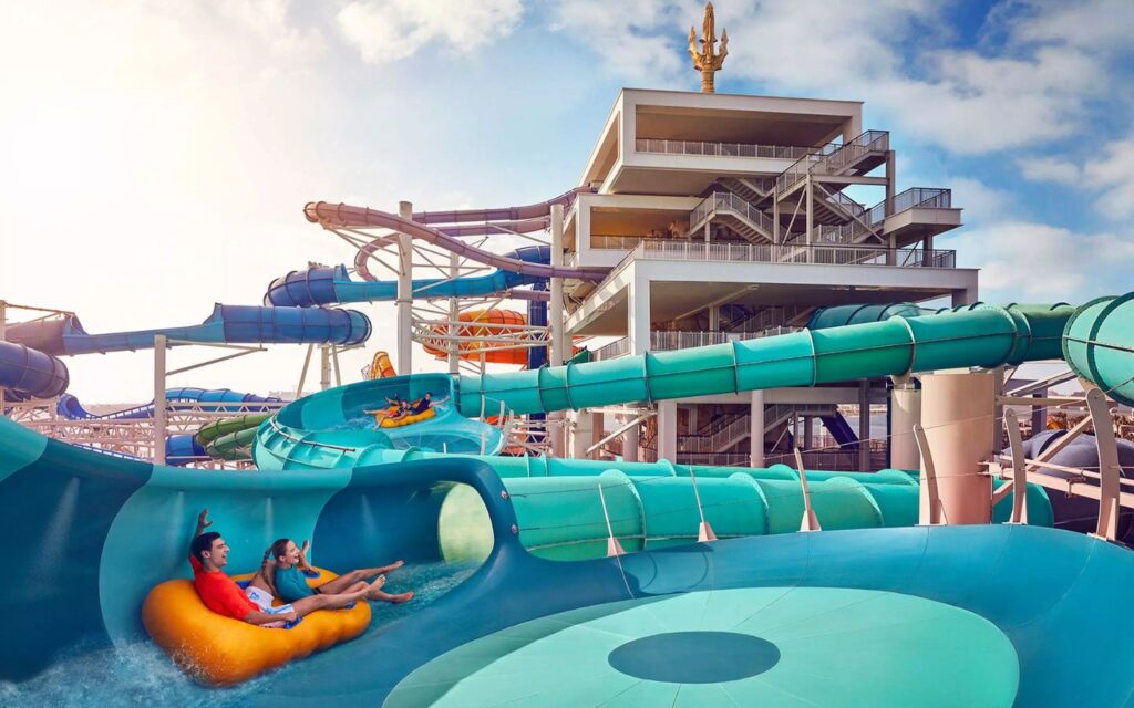 Family enjoying Blackout ride in Aquaventure waterpark