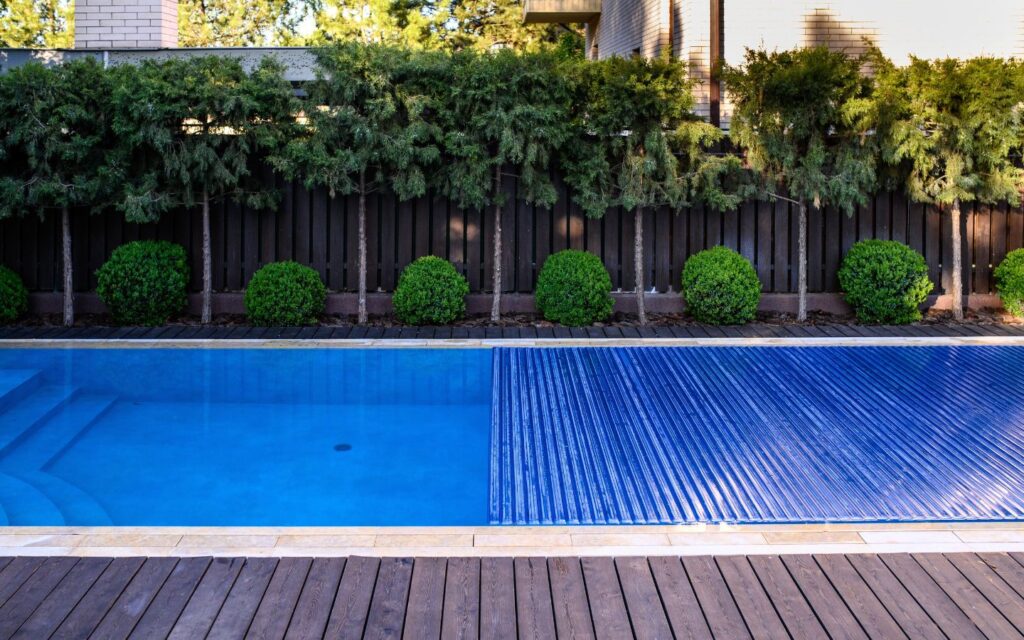 automatic pool covers can reduce pool evaporation during summers