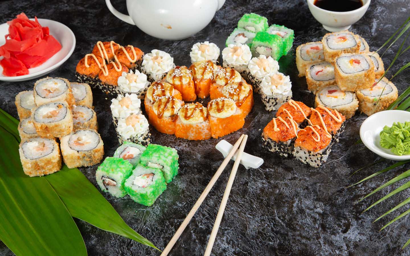 Wide platter of sushi and rolls