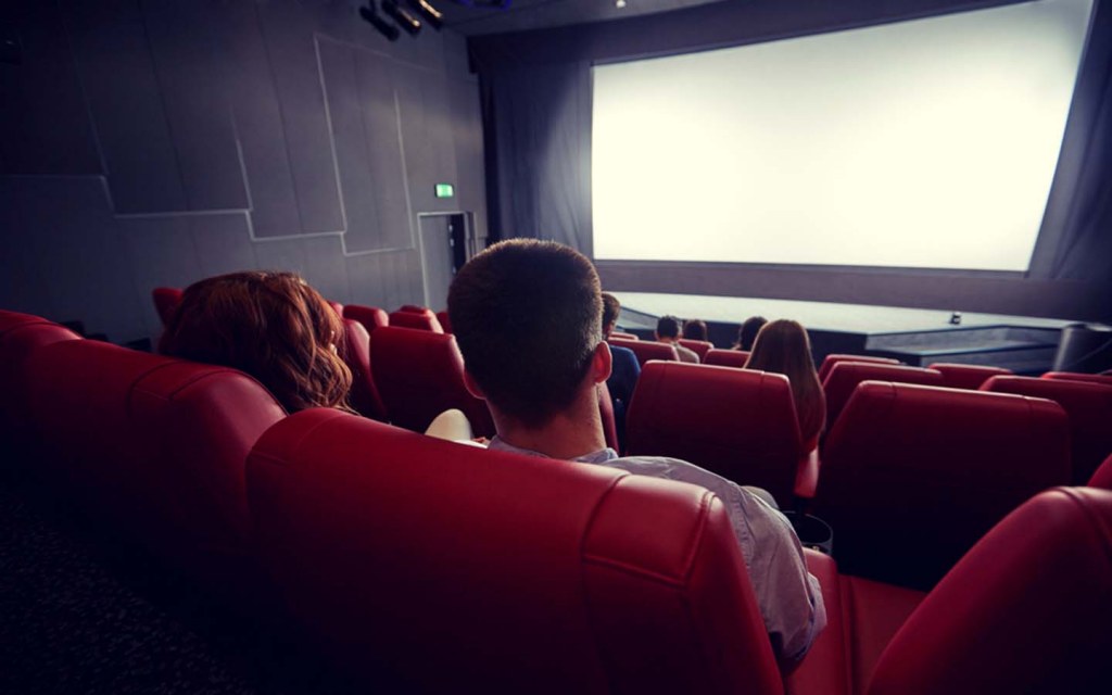 People sitting in the best cinema in Sharjah