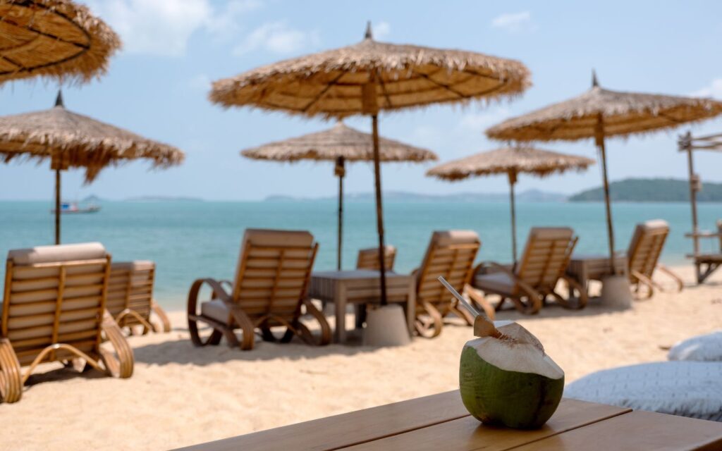 Coconut drink on a table at a beach club in dubai