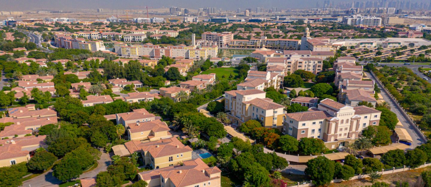 Comparison of Dubai Investments Park and Motor City for buying or renting property in Dubai
