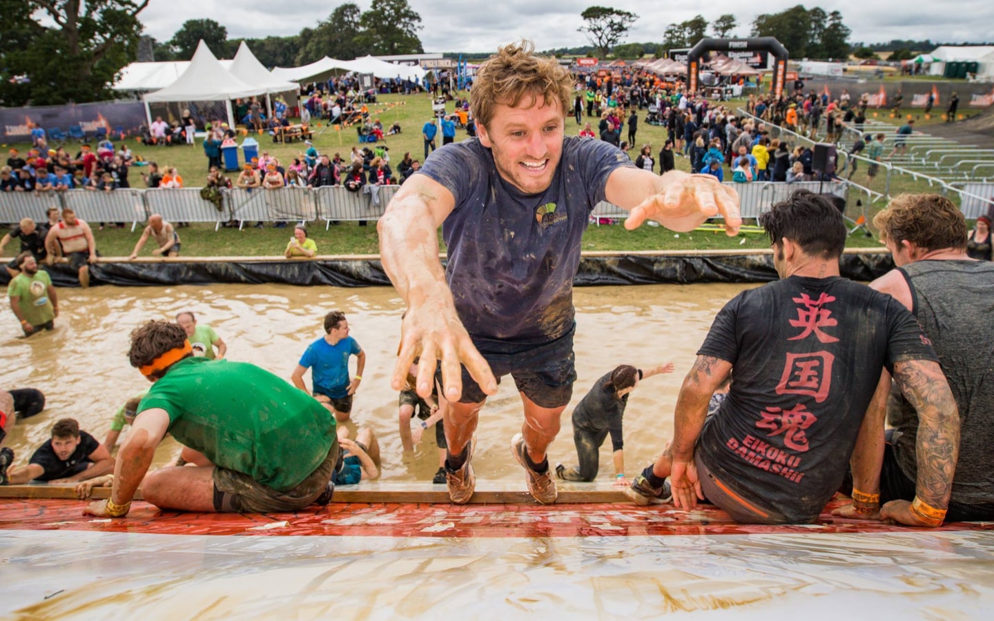 Person completing Tough Mudder Challenge