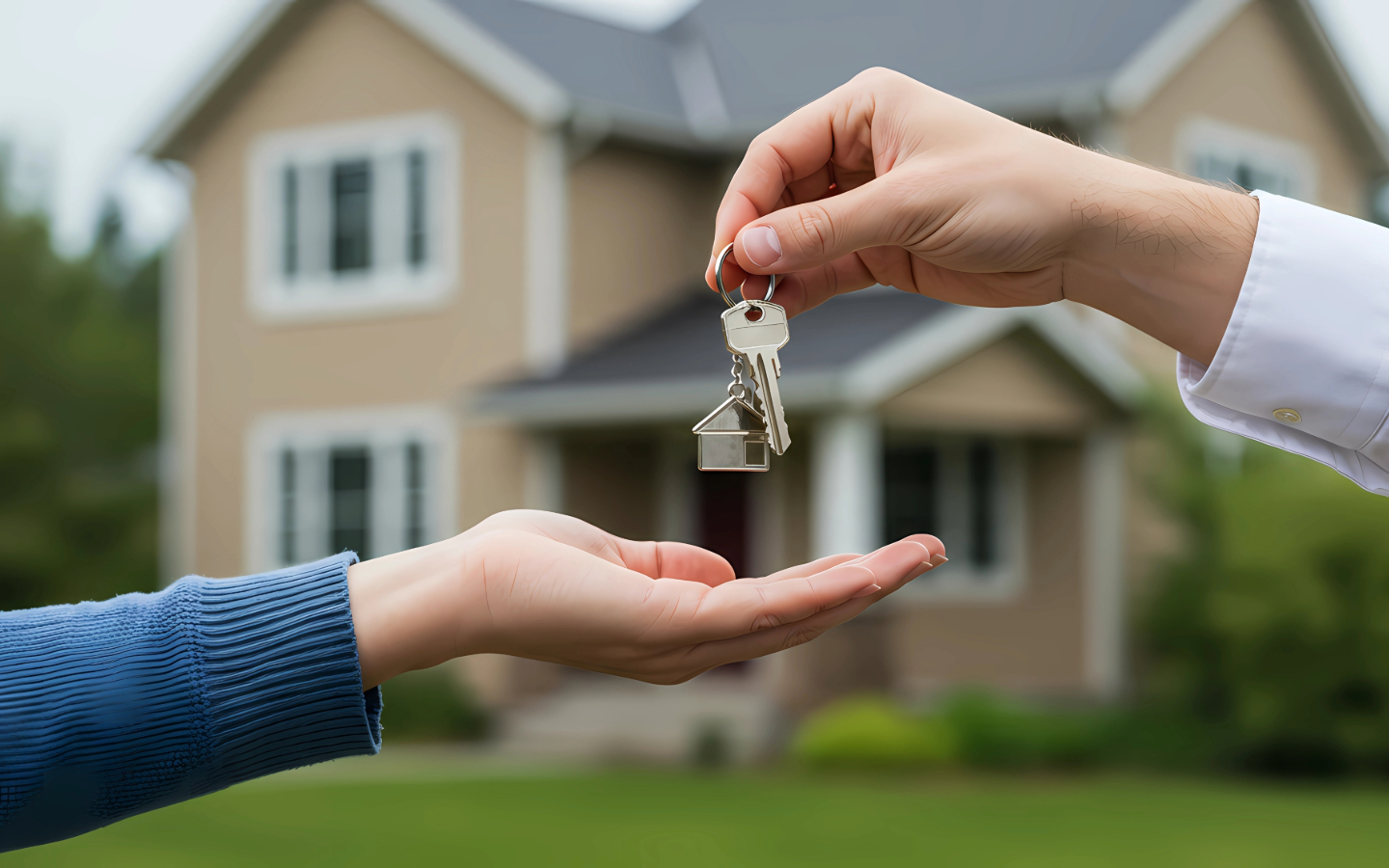Property handover in Dubai showing a buyer receiving keys to a newly completed residential property from a developer