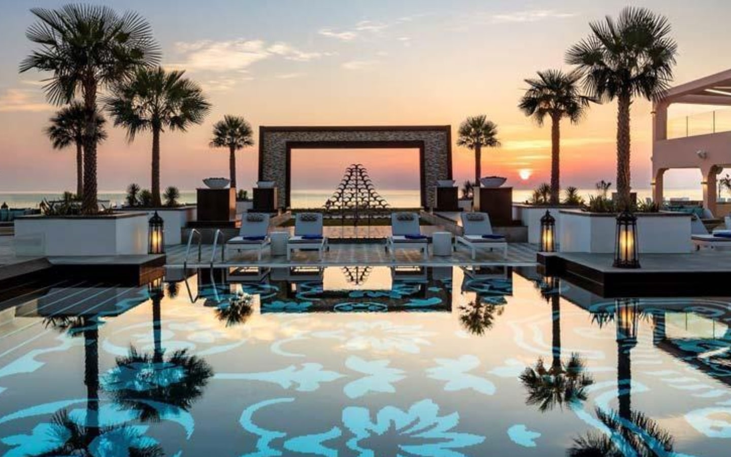 View of pool and sunset at Fairmont Fujairah Beach Resort