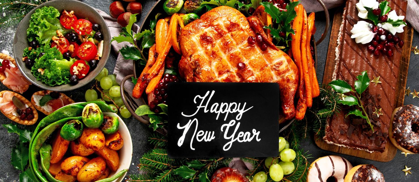 Gourmet breakfast spread with desserts and drinks for a festive brunch.