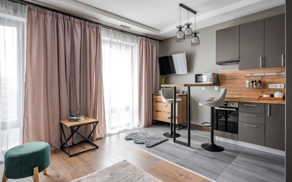 Floor-length curtains hung high and wide
