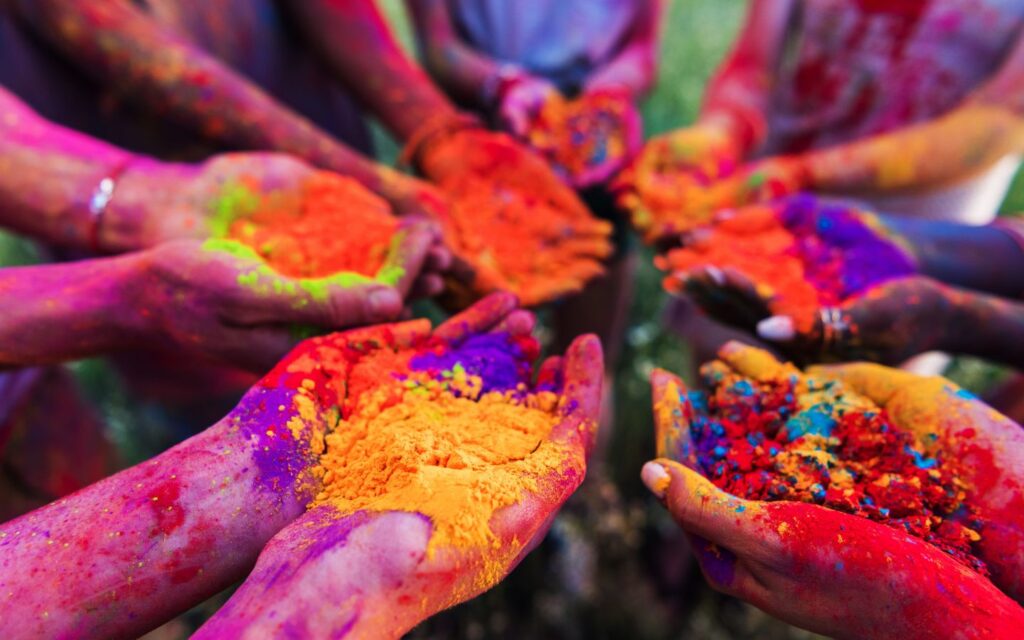 Friends having fun during a Holi celebration.