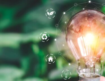 electricity bulb with energy saving icons