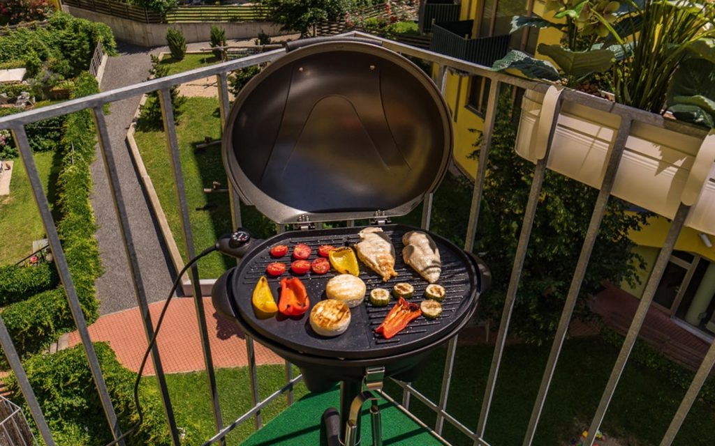 A small grill set in an apartment terrace