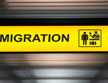 Direction to immigration counter, where overstay fines in the UAE are enforced