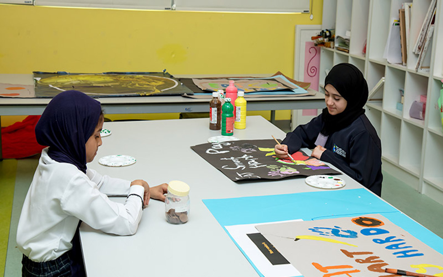 two school children working on a project