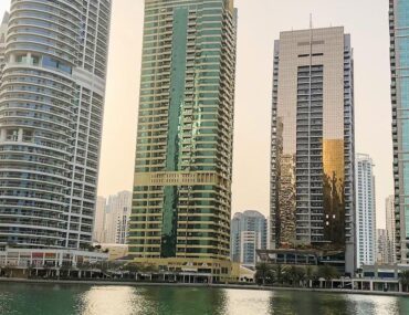 A row of modern, high-rise skyscrapers in Jumeirah Lakes Towers (JLT), Dubai