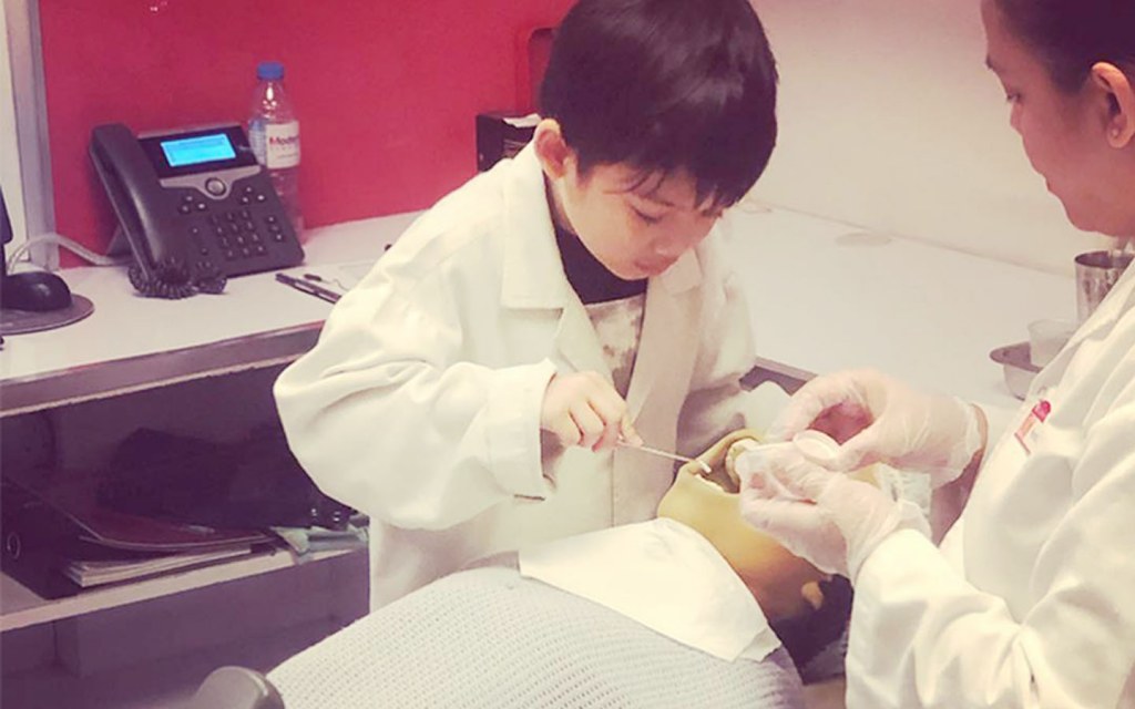 Young doctors learning basic medical skills at KidZania Dubai.