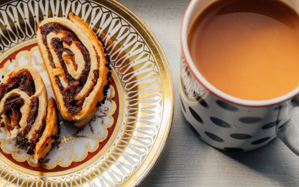 Kleicha are Middle Eastern pastries filled with dates and spices and featured in traditional Eid food spreads