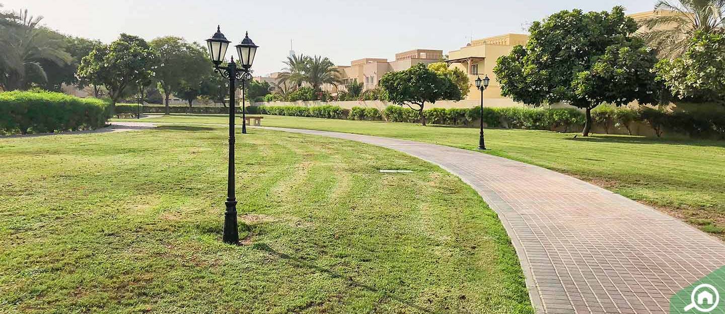 A view of a peaceful park in The Meadows Dubai