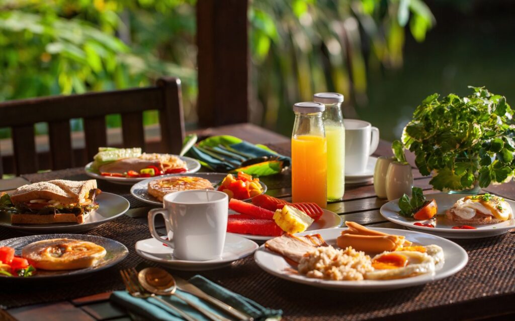 Festive brunch table with gourmet dishes and drinks for New Year’s Day brunch in Dubai.