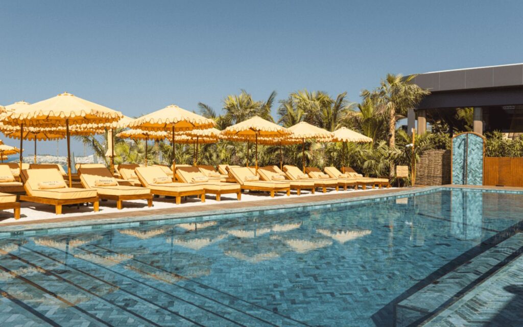 Ninive Beach is the ultimate getaway at J1 Beach Dubai with an array of deals along with poolside dining option