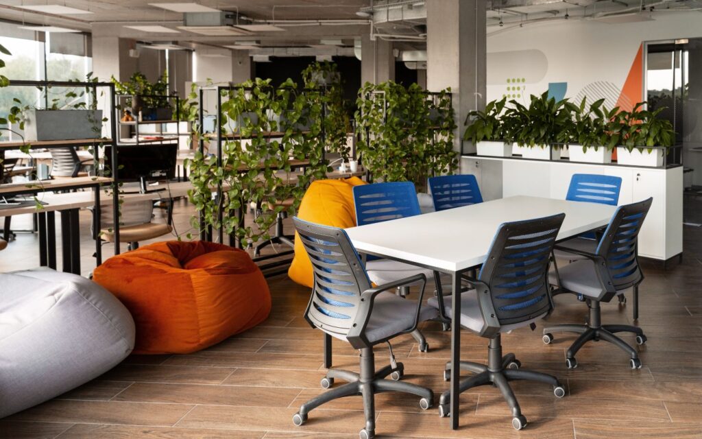 Open modern office space with flexible seating and collaborative zones.