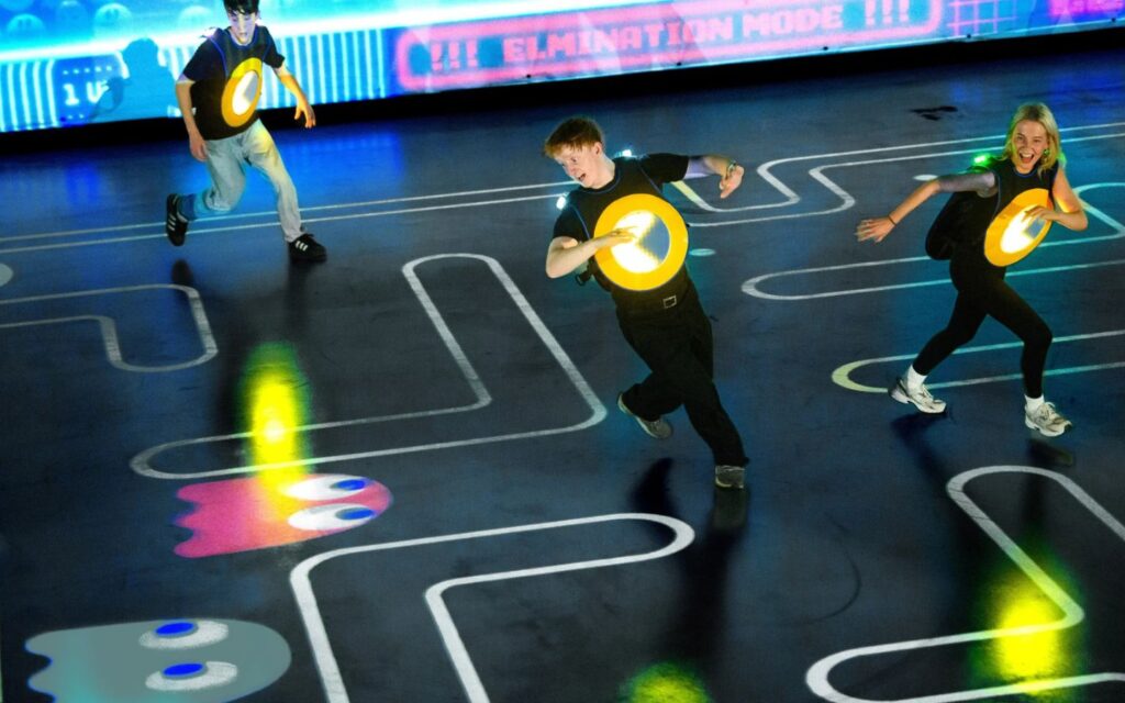 Players on the floor at Pac-Man Live Experience Dubai