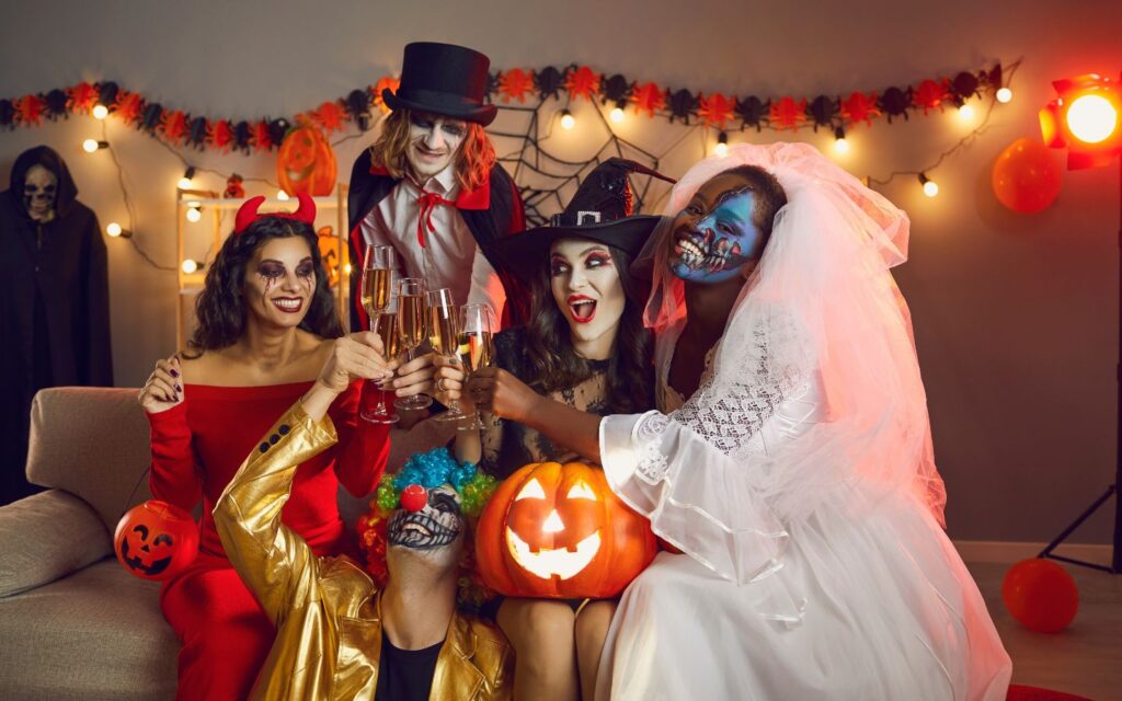 Group of friends costumd for halloween at a party 