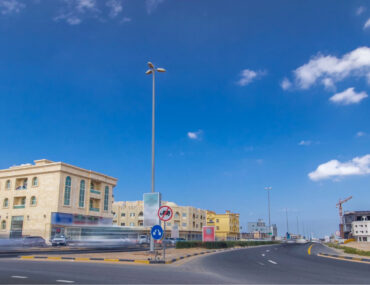 Ajman cityscape featuring completed and under-construction villas