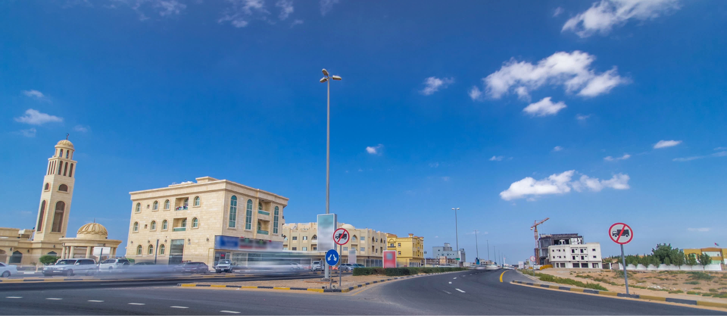 Ajman cityscape featuring completed and under-construction villas