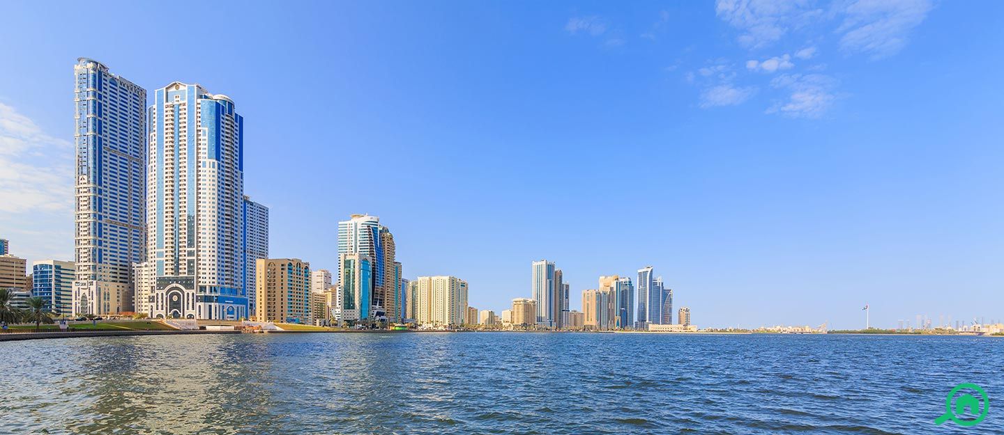 Modern residential towers in Sharjah showcasing chiller-free apartments for rent