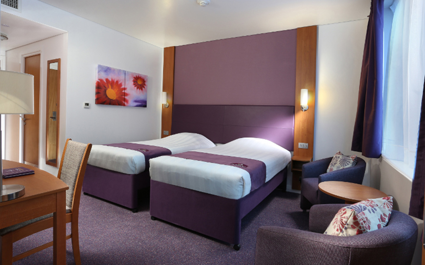 Inside of a bedroom at Premier Inn Abu Dhabi