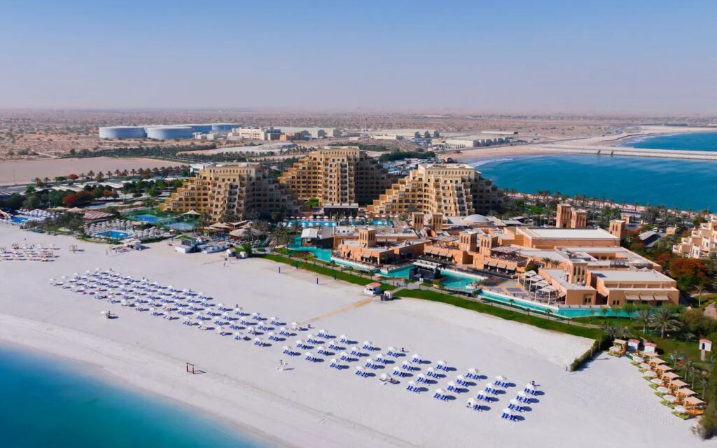 aerial view of beachfront resort offering luxury national day staycations in Ras Al Khaimah