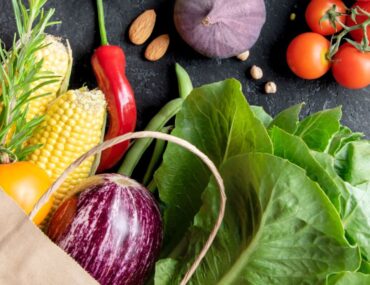 Ingredients for multiple meals including grains, vegetables, meat packs and dairy products.