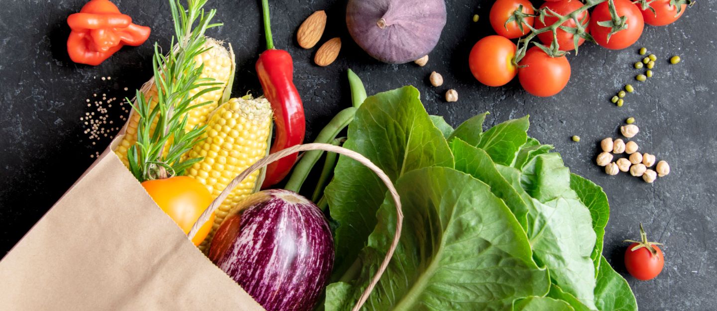 Ingredients for multiple meals including grains, vegetables, meat packs and dairy products.