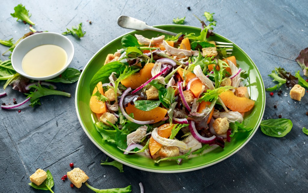 Salad plate having chicken in it