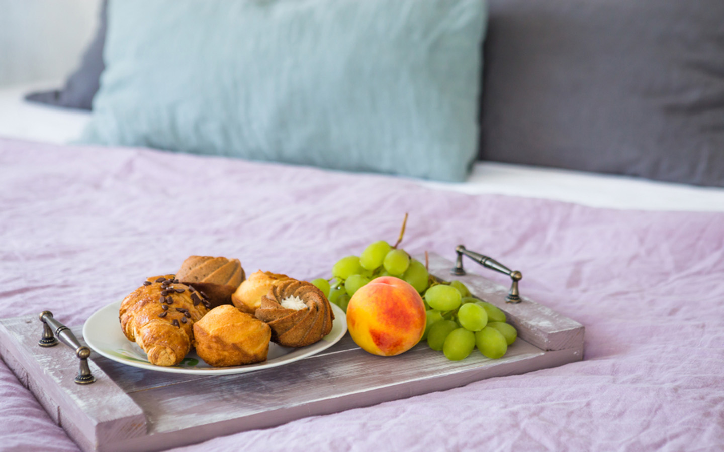 Close-up shot of a healthy breakfast lying on the bed at Skybridge hotel Abu Dhabi