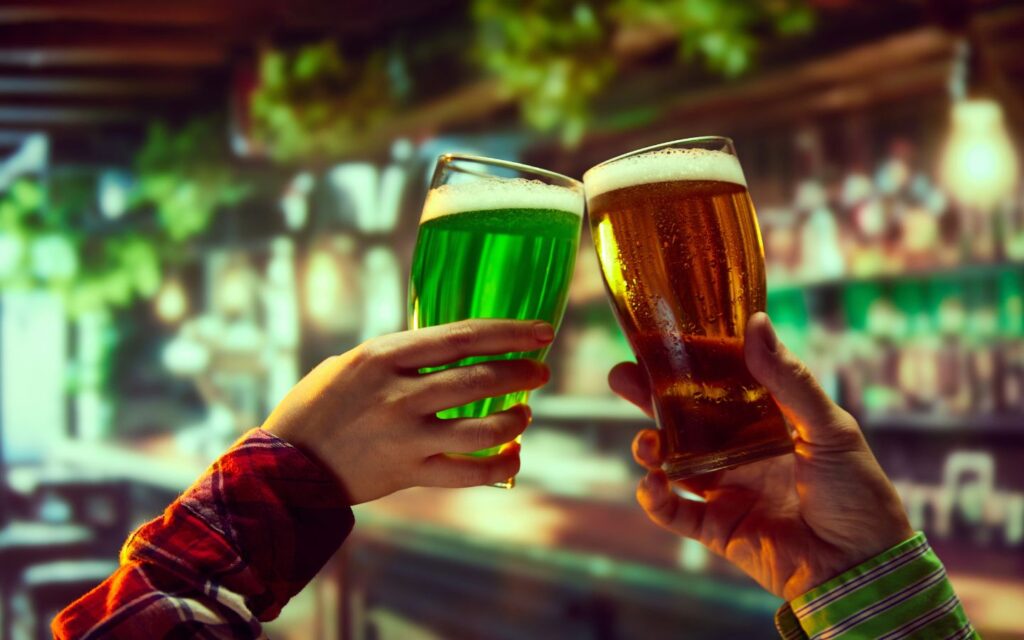People enjoying Irish food and drinks in Dubai.