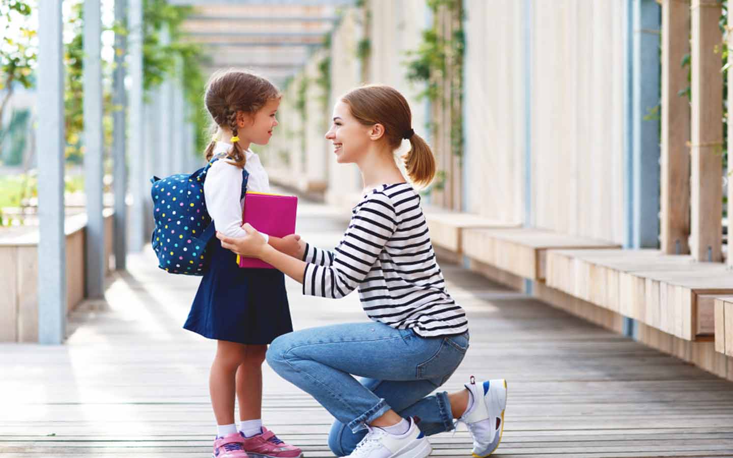 A teacher talking to a student