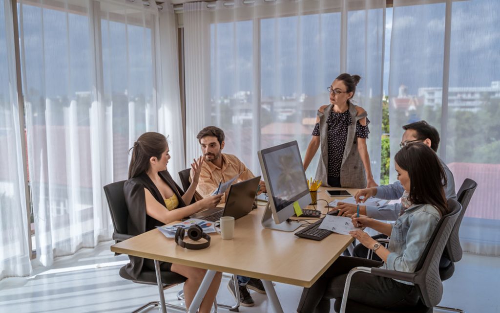 People discussing ideas with a team from one of the business setup companies in Dubai