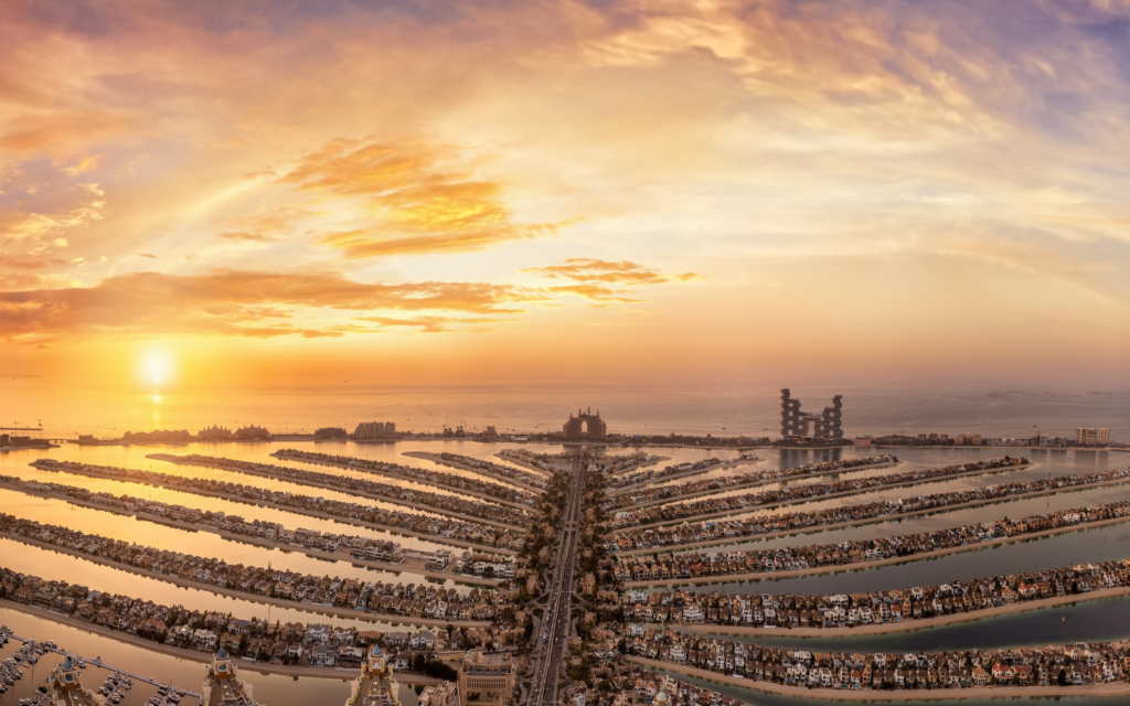Vibrant sunset over Palm Jumeirah and Dubai skyline, a must-visit among Dubai sunset viewing spots.