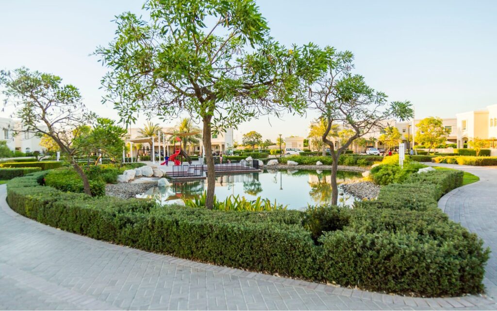 Trees and a pond in Al Ghadeer UAE