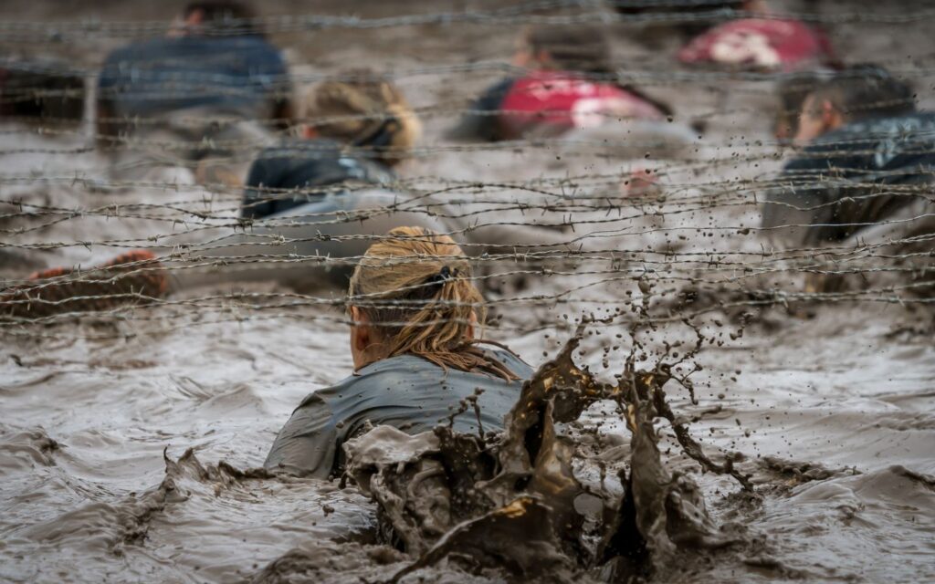 Participants tackling an obstacle course race in Dubai.