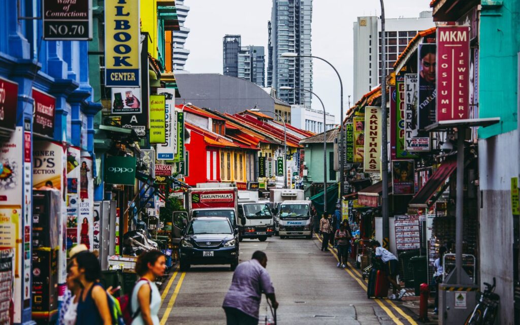 Street decorated with lanterns and traditional shopfronts in Singapore.