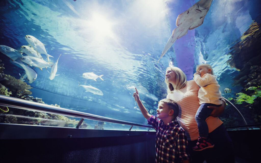 Mother with kids at an aquarium